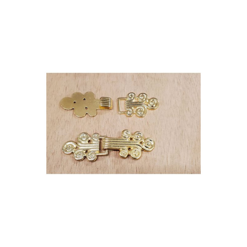 Bouton brandebourg métal doré – 6 cm x 2 cm – mercerie couture
