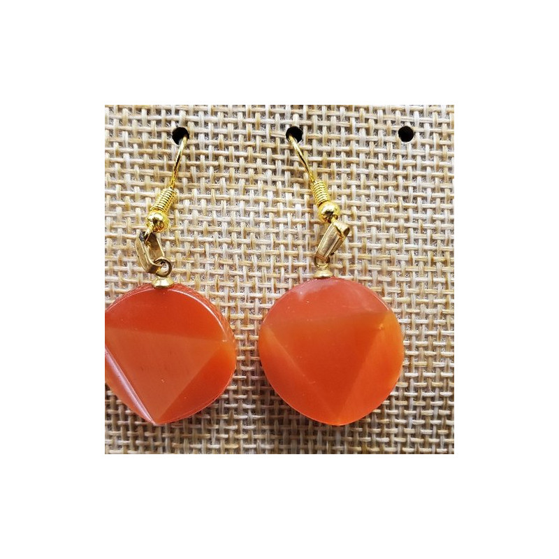 paire de boucle d'oreille en triangle dans un cercle symbole de force orange