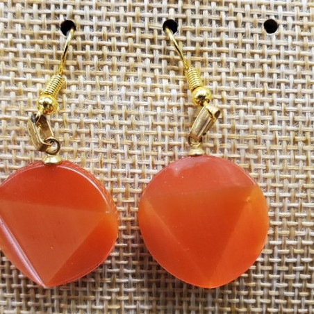 paire de boucle d'oreille en triangle dans un cercle symbole de force orange