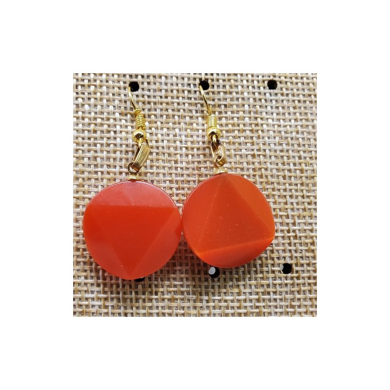 paire de boucle d'oreille en triangle dans un cercle symbole de force rouge oranger