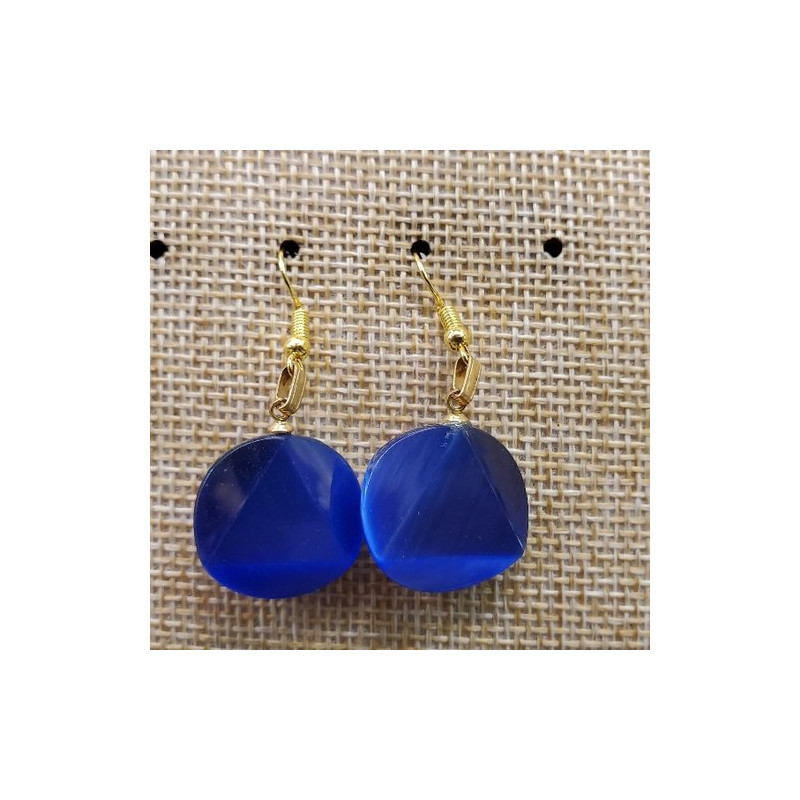 paire de boucle d'oreille en triangle dans un cercle symbole de force bleu roi