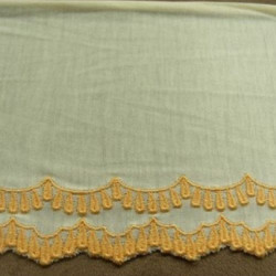 BRODERIE ECRU SUR JERSEY DE COTON ORANGE LARGEUR 13 cm / hauteur de broderie 3,5 cm
