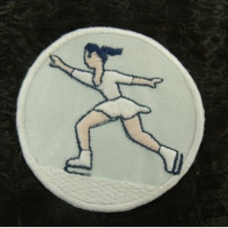 écusson thermocollant MOTIF: patineuse avec robe blanche diamètre: 5,5cm
