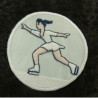 écusson thermocollant MOTIF: patineuse avec robe blanche diamètre: 5,5cm