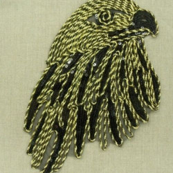 AIGLE  noir et or application tissée, hauteur 33 cm sur largeur de 19cm