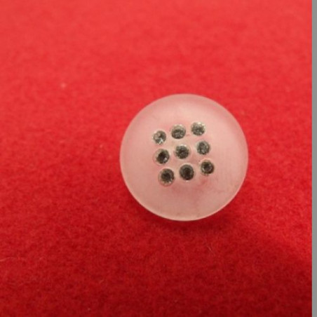 bouton incrusté de petits strass,très lumineux et résistant