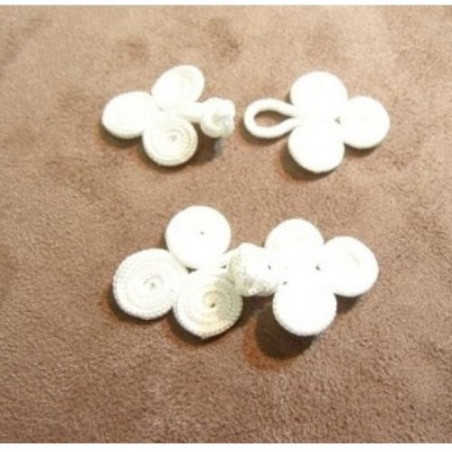 bouton brandebourg longueur 5.5 cm sur largeur de 2.5 cm