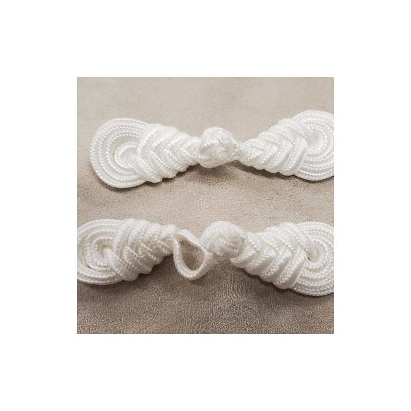 BOUTON BRANDEBOURG blanc longueur 8 cm/ largeur 2,3 cm