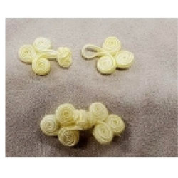 BOUTON BRANDEBOURG - jaune, longueur de 5,5cm sur la largeur de 2,5cm