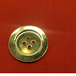 bouton/bijou métallique...