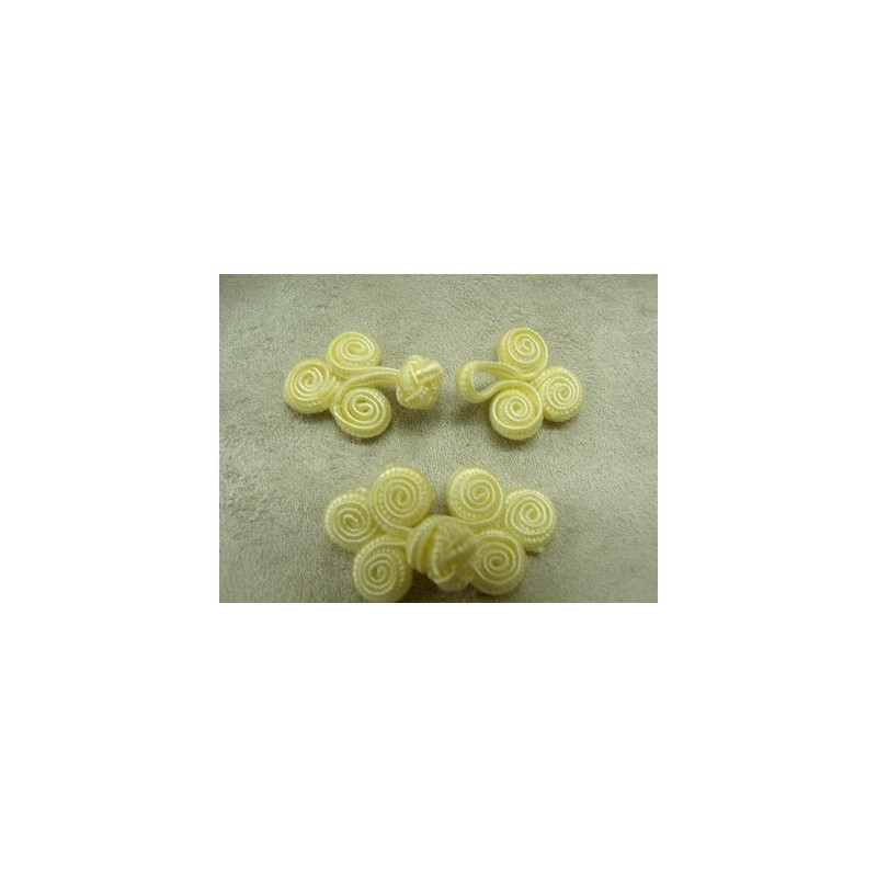 bouton brandebourg longueur 5.5  cm sur largeur de 2.5 cm