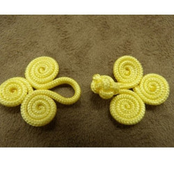 bouton brandebourg longueur 5.5  cm sur largeur de 2.5 cm